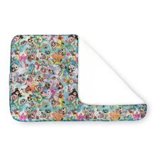 Load image into Gallery viewer, Kanga Care Changing Pad and Sheet Saver in the print called tokiSweet tokidoki unicorns, and rainbows, with a white plush backing shown by folding one corner over, on a white background.