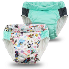 Load image into Gallery viewer, Two children's swim diapers and training pants, one with a cartoon pattern and the other plain teal, on a white background.