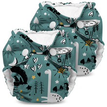 Load image into Gallery viewer, Lil Joey Newborn and preemie AIO cloth Diaper by Kanga Care in Roam Free with a whimsical space-themed print in teal, featuring white fluffy dinosaurs, black stars and hearts, and gold accents, shown on a white background.