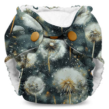 Load image into Gallery viewer, Newborn and preemie Lil Joey cloth diaper with dandelion pattern on a navy background