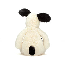 Load image into Gallery viewer, Bashful Black &amp; Cream Puppy seated rear view
