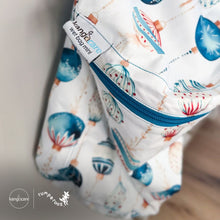 Load image into Gallery viewer, Kanga Care wet bag mini with blue zipper and shell pattern on a neutral background print Glaskugeln with blue and red ornament pattern on a white background