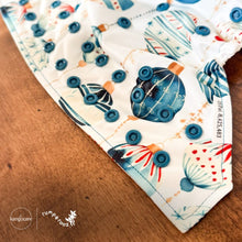 Load image into Gallery viewer, Rumparooz One Size Cloth Diaper laying open on table showing blue snaps in Christmas print called Glaskugeln with blue and red ornament pattern on a white background