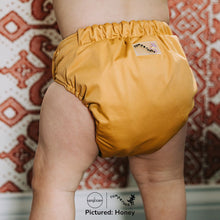 Load image into Gallery viewer, Baby in Honey Yellow Rumparooz G3 One Size Pocket Diaper