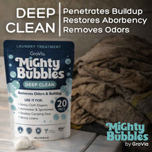 Load image into Gallery viewer, Mighty Bubbles laundry treatment package with text about its features on a wooden surface.