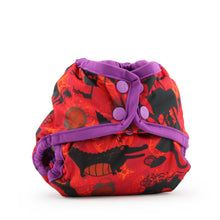 Load image into Gallery viewer, Rumparooz Newborn Cloth Diaper Cover by Kanga Care in the print called Hook with a Hook pirate from Peter Pan print featuring black alligator and bat silhouettes on a bright red background, finished with purple trim and snap closures.