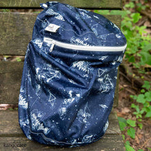 Load image into Gallery viewer, Shine Bright Wet Bag sitting on a wooden bench