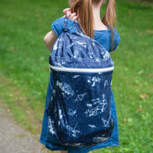 Load image into Gallery viewer, child carrying Shine Bright Wet Bag over their shoulder as they walk away from the camera