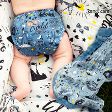 Load image into Gallery viewer, Wander Rumparooz One Size Pocket Cloth Diaper baby laying on Bamboo Reversible Blanket