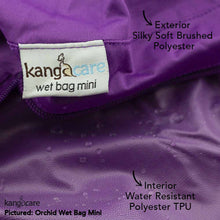 Load image into Gallery viewer, Zoomed in view of an Orchid Wet Bag Mini to show fabric features on the interior and exterior