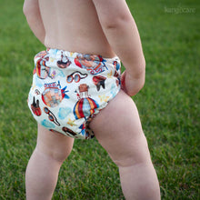 Load image into Gallery viewer, Zeppelin Rumparooz OBV One Size Pocket Diaper on a standing toddler
