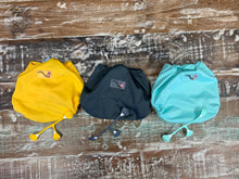 Load image into Gallery viewer, Dandelion, Castle, and Sweet Rumparooz covers and matching snappis