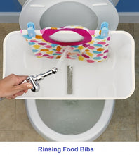 Load image into Gallery viewer, Splatter shield on a toilet with a sprayer - bib