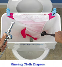 Load image into Gallery viewer, Diaper sprayer and splatter shield on a toilet 
