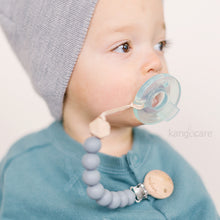 Load image into Gallery viewer, Baby with Graphite Paci Clip attached to their top and soother, zoomed in