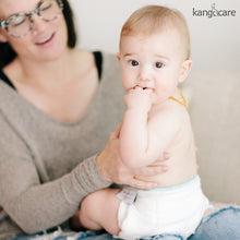 Load image into Gallery viewer, Baby sitting, wearing a Kanga Care Prefold