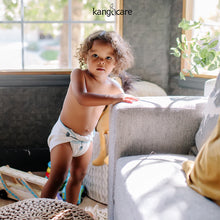 Load image into Gallery viewer, Toddler standing in a Kanga Care Prefold
