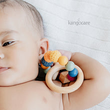 Load image into Gallery viewer, Baby holding a Mod Teething Ring