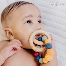 Load image into Gallery viewer, Baby holding a Mod Teething Ring in their mouth