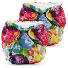 Load image into Gallery viewer, Lil Joey Newborn and preemie AIO cloth Diaper by Kanga Care in tokiCorno tokidoki with a colorful cartoon Unicorno print, featuring yellow snap closures and white fleece lining, shown on a plain white background.
