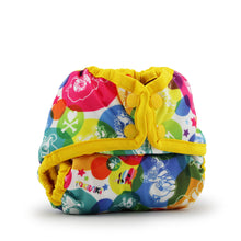 Load image into Gallery viewer, Rumparooz Newborn Cloth Diaper Cover by Kanga Care in the print called tokiCorno tokidoki with a bright yellow trim and strap, featuring a playful multicolor pattern of cartoon characters and shapes on a white background.
