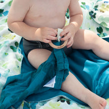 Load image into Gallery viewer, Baby sitting on a Clover Forever Blanket with a Clover Teething Lovey
