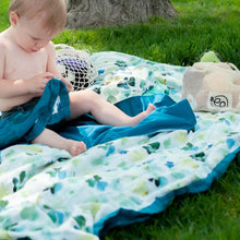 Load image into Gallery viewer, Baby sitting on a Clover Forever Blanket with a Clover Teething Lovey
