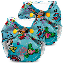 Load image into Gallery viewer, Lil Joey Newborn and preemie AIO cloth Diaper by Kanga Care in tokiSea tokidoki with a vibrant blue ocean-themed cartoon print, featuring yellow snap closures and white fleece lining, shown on a clean white background.
