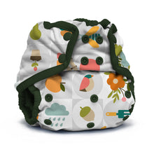 Load image into Gallery viewer, Rumparooz One Size Cloth Diaper Cover in the print Bloom with a white base, dark green trim, and a colorful patchwork print featuring fruit, flowers, birds, rain clouds, and gardening tools, shown on a clean white background.
