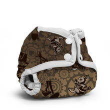 Load image into Gallery viewer, Rumparooz Newborn Cloth Diaper Cover by Kanga Care in the print called White Rabbit from Alice in Wonderland with a brown steampunk pattern featuring gears, birds, and tools, accented with white elastic trim and snap closures, shown on a white background.
