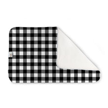 Load image into Gallery viewer, Kanga Care Changing Pad and Sheet Saver in the print called Buffalo with a black and white buffalo check pattern on one side and a soft white fleece backing on the other, shown on a clean white background.
