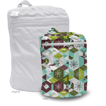 Load image into Gallery viewer, Kanga Care Wet Bag Mini for cloth diapers in the print Frolic with a large white compressed storage bag labeled 'original' behind a smaller packed cube labeled 'mini' featuring a colorful geometric pattern in teal, green, burgundy, and white.
