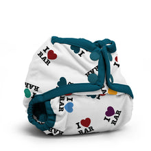 Load image into Gallery viewer, Rumparooz Newborn Cloth Diaper Cover by Kanga Care in the print called I Love RAR with a white base printed with black text reading 'I ♥ RAR' and small multicolored heart and clover motifs, finished with teal elastic trim and straps.
