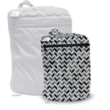 Load image into Gallery viewer, Kanga Care Wet Bag MIni for cloth diapers in the print called Zev with a black and white chevron patterned laundry bag on a white background
