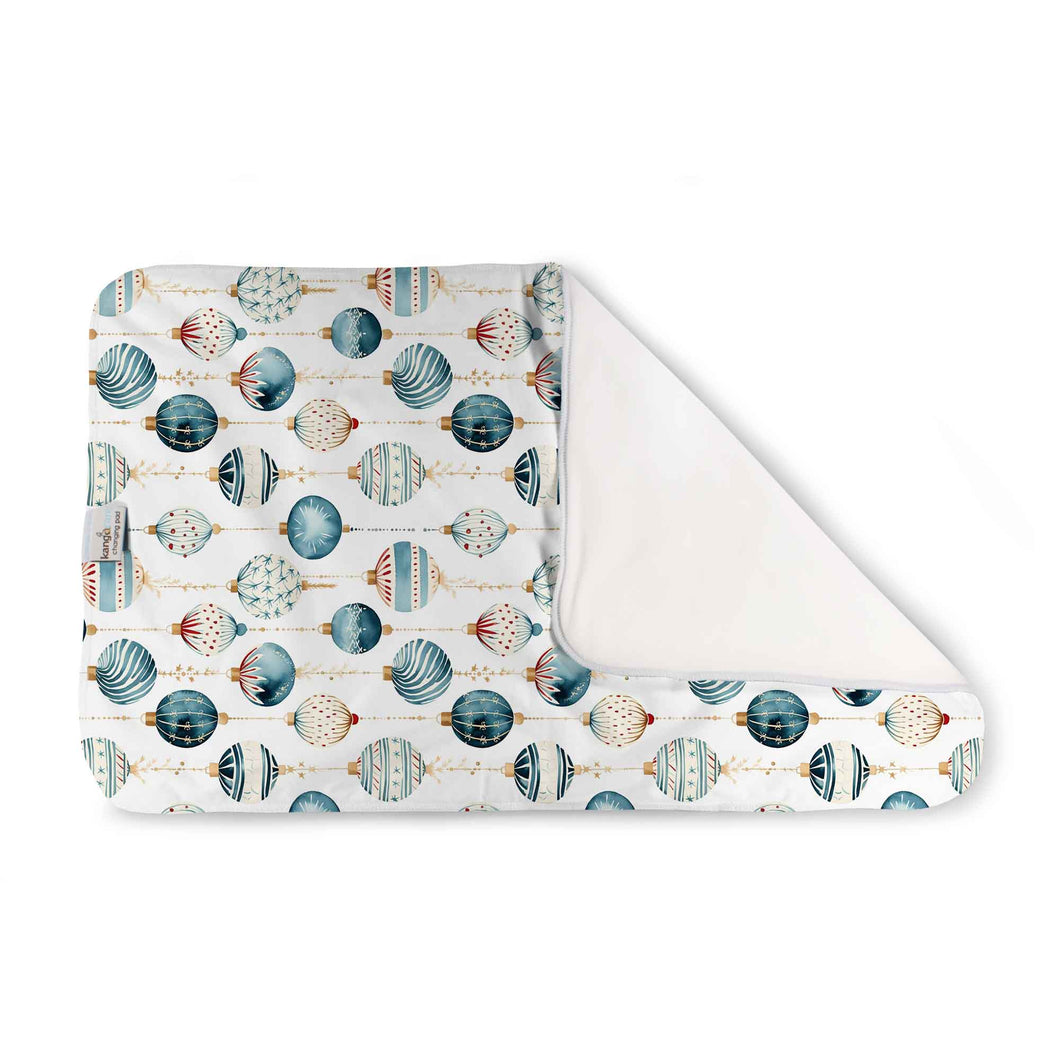 Kanga Care Changing Pad and Sheet Saver in Christmas print called Glaskugeln with blue and red ornament pattern on a white background