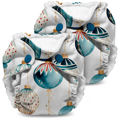 Lil Joey Newborn and preemie AIO cloth Diaper by Kanga Care in Christmas print called Glaskugeln with blue and red ornament pattern on a white background