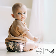 Load image into Gallery viewer, Baby wearing Boo Rumparooz One Size Pocket Cloth Diaper 
