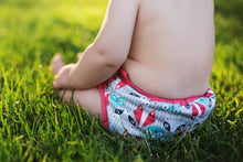 Load image into Gallery viewer, Clyde Diaper Cover on a sitting baby
