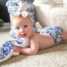 Load image into Gallery viewer, Elskede Rumparooz OBV cloth diaper on a baby layingon her tummy playing with an Elskede Changing Pad

