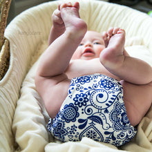 Load image into Gallery viewer, Elskede Rumparooz OBV cloth diaper on a baby laying in a basket
