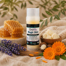 Load image into Gallery viewer, GroVia Magic Stick with honeycomb, lavender, and flowers on a natural background
