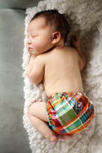 Load image into Gallery viewer, Baby laying on their belly, curled up wearing Quinn Lil Joey
