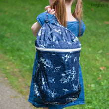 Load image into Gallery viewer, child carrying Shine Bright Wet Bag over their shoulder as they walk away from the camera
