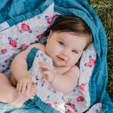 Load image into Gallery viewer, Baby wrapped up in a Lily Baby blanket
