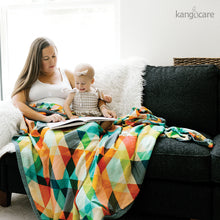 Load image into Gallery viewer, Person and baby sitting on a couch with a Finn Forever Blanket
