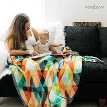 Load image into Gallery viewer, Woman and toddler sitting with a Finn blanket
