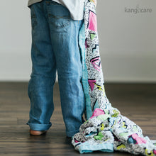 Load image into Gallery viewer, Child carrying a Radical baby blanket
