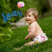 Load image into Gallery viewer, baby sitting in grass wearing a Soar Rumparooz
