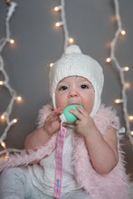 Load image into Gallery viewer, Baby holding a Teething Egg and Companion Clip
